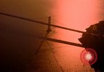 Image of Golden Gate bridge at sunset San Francisco California USA, 1967, second 11 stock footage video 65675020978