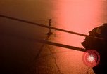Image of Golden Gate bridge at sunset San Francisco California USA, 1967, second 12 stock footage video 65675020978