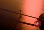 Image of Golden Gate bridge at sunset San Francisco California USA, 1967, second 16 stock footage video 65675020978