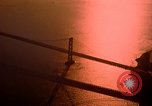 Image of Golden Gate bridge at sunset San Francisco California USA, 1967, second 17 stock footage video 65675020978