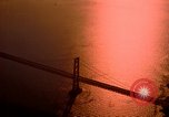 Image of Golden Gate bridge at sunset San Francisco California USA, 1967, second 22 stock footage video 65675020978