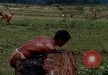 Image of Montagnard tribesmen Camp Enari Vietnam, 1967, second 52 stock footage video 65675021015