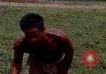 Image of Montagnard tribesmen Camp Enari Vietnam, 1967, second 55 stock footage video 65675021015