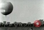 Standbild Ford Tri Motor und Balloon race Detroit Michigan USA, 1926, aus Sekunde 53 historischem Filmmaterial Videoclip 65675021036