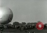 Standbild Ford Tri Motor und Balloon race Detroit Michigan USA, 1926, aus Sekunde 58 historischem Filmmaterial Videoclip 65675021036