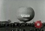 Standbild Ford Tri Motor und Balloon race Detroit Michigan USA, 1926, aus Sekunde 60 historischem Filmmaterial Videoclip 65675021036