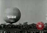 Standbild Ford Tri Motor und Balloon race Detroit Michigan USA, 1926, aus Sekunde 61 historischem Filmmaterial Videoclip 65675021036
