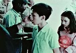 Image of American airlift of Vietnamese refugees Saigon Vietnam, 1975, second 12 stock footage video 65675021076