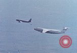 Image of  F-5E Tiger II fighters being loaded on C-5 transport aircraft California United States USA, 1976, second 43 stock footage video 65675021081