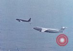 Image of  F-5E Tiger II fighters being loaded on C-5 transport aircraft California United States USA, 1976, second 44 stock footage video 65675021081