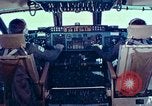 Image of  F-5E Tiger II fighters being loaded on C-5 transport aircraft California United States USA, 1976, second 48 stock footage video 65675021081