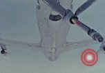 Image of  F-5E Tiger II fighters being loaded on C-5 transport aircraft California United States USA, 1976, second 50 stock footage video 65675021081