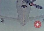 Image of  F-5E Tiger II fighters being loaded on C-5 transport aircraft California United States USA, 1976, second 51 stock footage video 65675021081