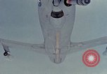 Image of  F-5E Tiger II fighters being loaded on C-5 transport aircraft California United States USA, 1976, second 52 stock footage video 65675021081