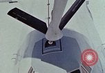 Image of  F-5E Tiger II fighters being loaded on C-5 transport aircraft California United States USA, 1976, second 56 stock footage video 65675021081