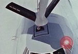 Image of  F-5E Tiger II fighters being loaded on C-5 transport aircraft California United States USA, 1976, second 58 stock footage video 65675021081