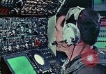 Image of  F-5E Tiger II fighters being loaded on C-5 transport aircraft California United States USA, 1976, second 61 stock footage video 65675021081
