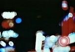 Image of Times Square neon lights in rain New York City USA, 1954, second 3 stock footage video 65675021110