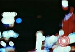 Image of Times Square neon lights in rain New York City USA, 1954, second 7 stock footage video 65675021110