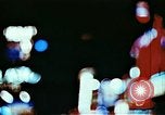 Image of Times Square neon lights in rain New York City USA, 1954, second 9 stock footage video 65675021110