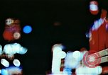 Image of Times Square neon lights in rain New York City USA, 1954, second 10 stock footage video 65675021110