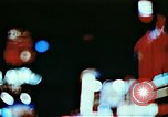 Image of Times Square neon lights in rain New York City USA, 1954, second 11 stock footage video 65675021110