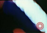 Image of Times Square neon lights in rain New York City USA, 1954, second 17 stock footage video 65675021110