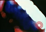 Image of Times Square neon lights in rain New York City USA, 1954, second 21 stock footage video 65675021110