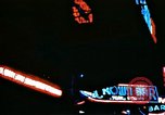 Image of Times Square neon lights in rain New York City USA, 1954, second 35 stock footage video 65675021110