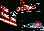 Image of Times Square neon lights in rain New York City USA, 1954, second 37 stock footage video 65675021110