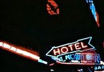 Image of Times Square neon lights in rain New York City USA, 1954, second 38 stock footage video 65675021110