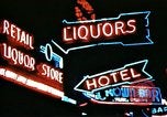 Image of Times Square neon lights in rain New York City USA, 1954, second 40 stock footage video 65675021110