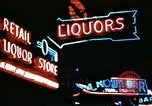 Image of Times Square neon lights in rain New York City USA, 1954, second 43 stock footage video 65675021110