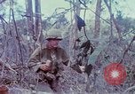 Image of Soldiers help injured South Vietnam, 1967, second 22 stock footage video 65675021190