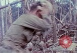 Image of Soldiers help injured South Vietnam, 1967, second 25 stock footage video 65675021190