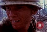 Image of Soldiers help injured South Vietnam, 1967, second 27 stock footage video 65675021190