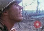 Image of Soldiers help injured South Vietnam, 1967, second 32 stock footage video 65675021190
