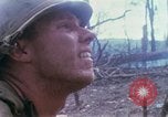 Image of Soldiers help injured South Vietnam, 1967, second 33 stock footage video 65675021190