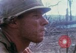Image of Soldiers help injured South Vietnam, 1967, second 34 stock footage video 65675021190