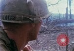 Image of Soldiers help injured South Vietnam, 1967, second 35 stock footage video 65675021190