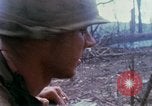 Image of Soldiers help injured South Vietnam, 1967, second 36 stock footage video 65675021190
