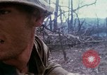 Image of Soldiers help injured South Vietnam, 1967, second 37 stock footage video 65675021190