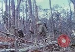 Image of Soldiers help injured South Vietnam, 1967, second 54 stock footage video 65675021190