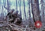 Image of Soldiers help injured South Vietnam, 1967, second 60 stock footage video 65675021190
