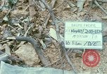 Image of wounded rescued by Huey helicopter South Vietnam, 1967, second 3 stock footage video 65675021192