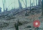 Image of wounded rescued by Huey helicopter South Vietnam, 1967, second 21 stock footage video 65675021192
