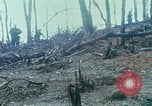 Image of wounded rescued by Huey helicopter South Vietnam, 1967, second 22 stock footage video 65675021192