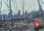 Image of wounded rescued by Huey helicopter South Vietnam, 1967, second 30 stock footage video 65675021192