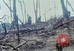 Image of wounded rescued by Huey helicopter South Vietnam, 1967, second 34 stock footage video 65675021192