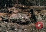 Image of wounded rescued by Huey helicopter South Vietnam, 1967, second 47 stock footage video 65675021192